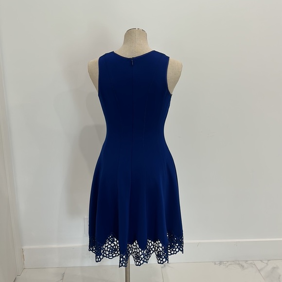 Classic style combines with modern, edge trend for a dress that is flattering. - Picture 3 of 8